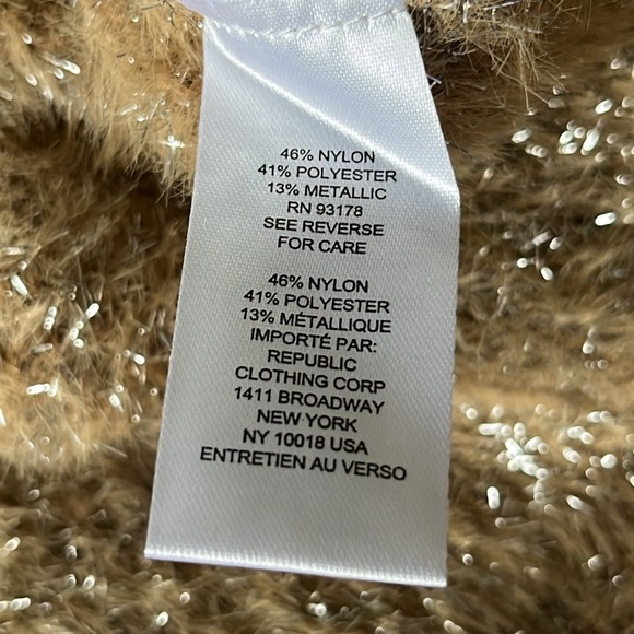 T Tahari Metallic Eyelash Knit Pullover
Sweater - Picture 7 of 7